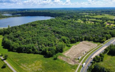 Aerial view of the Eden Springs site with the lake and surrounding woods